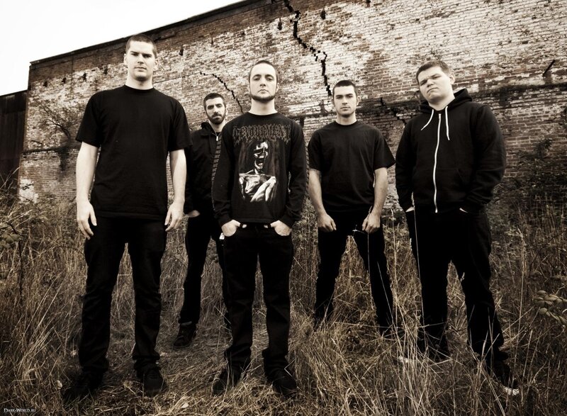 band in front of brick wall