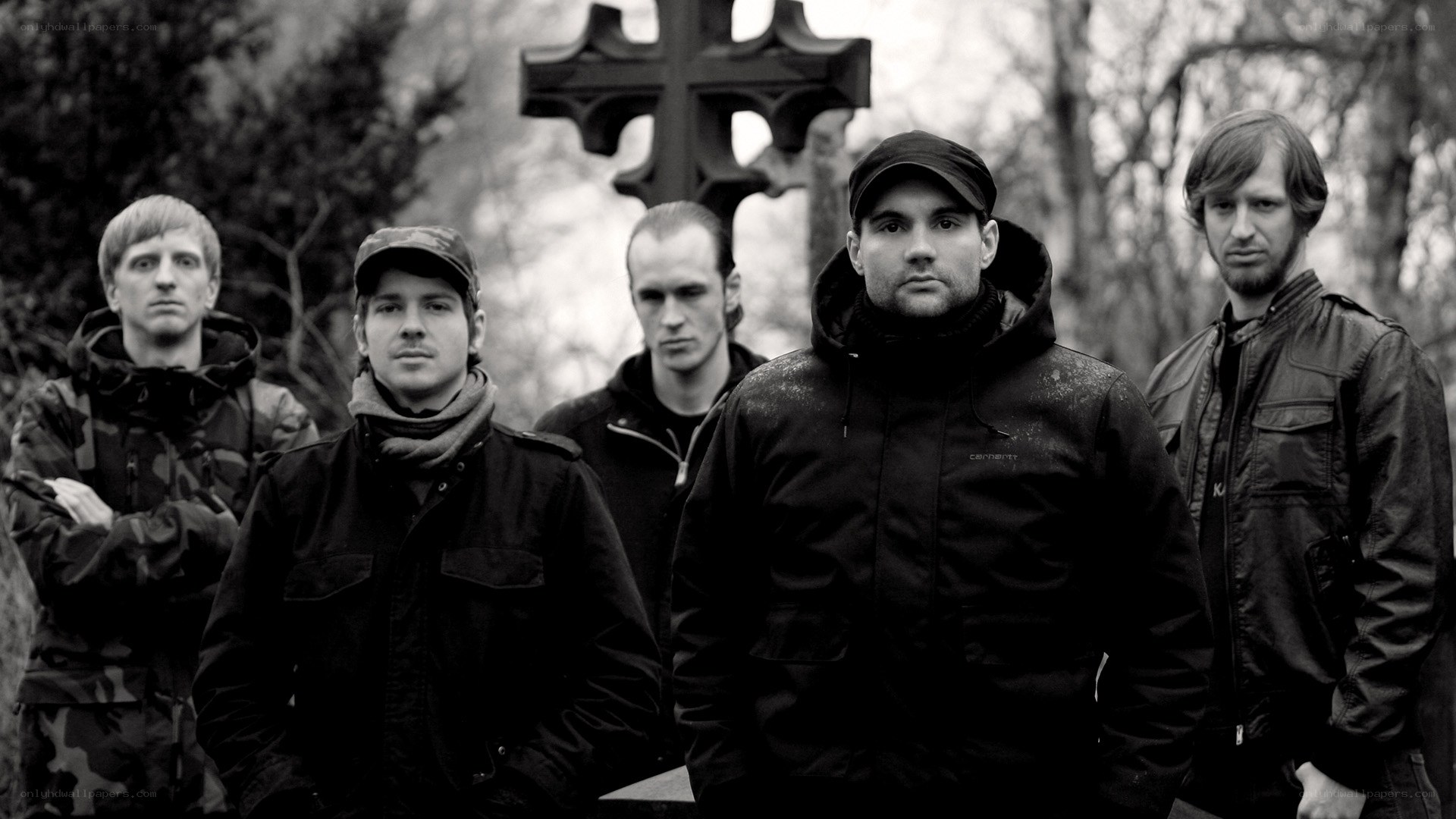 band in front of cross