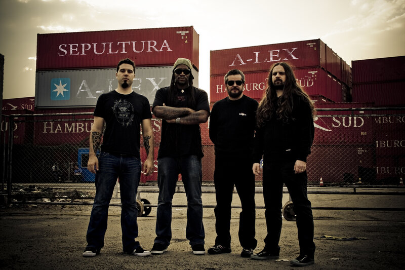 band in front of shipping containers