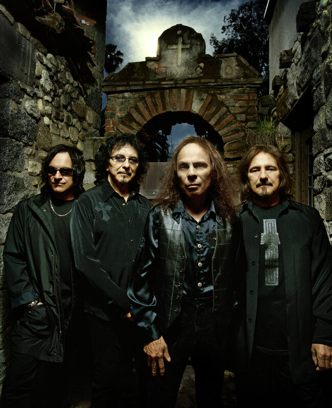 band in front of stone archway