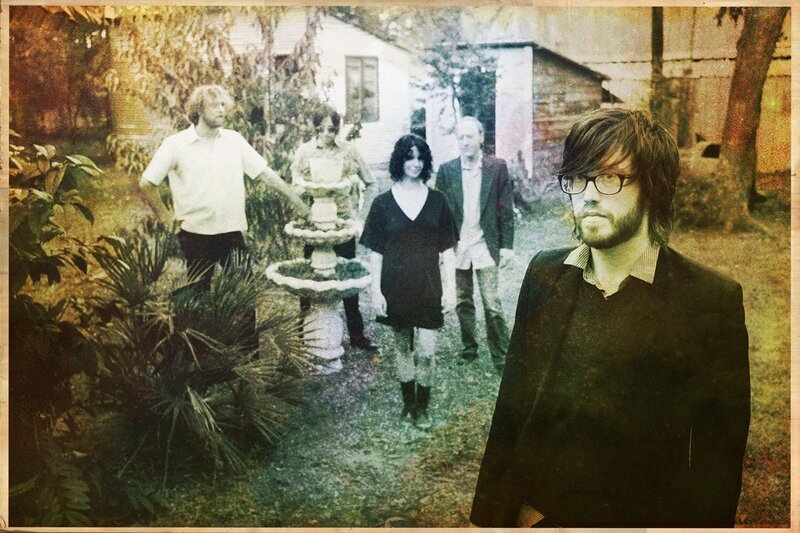 band in garden with fountain