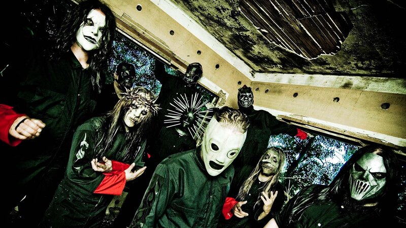 band in masks and costumes