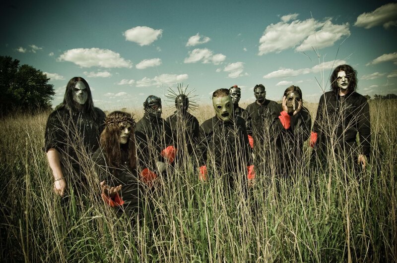 band in masks in a field