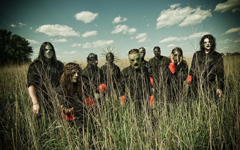 band in masks in a field
