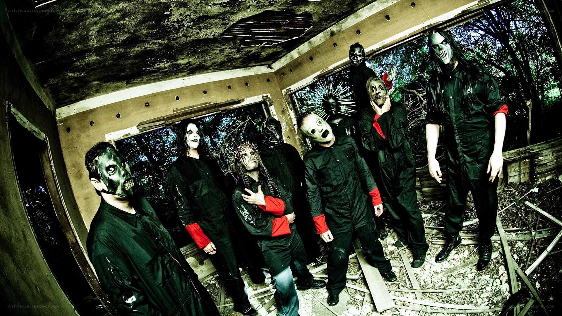 band in masks in abandoned building