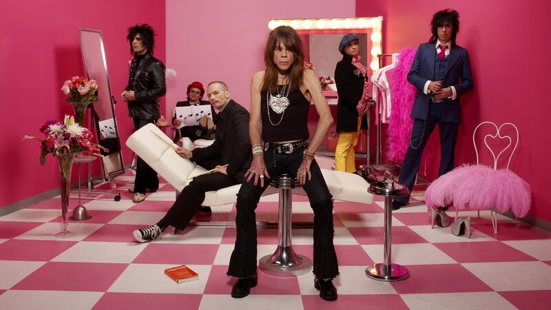 band in pink room