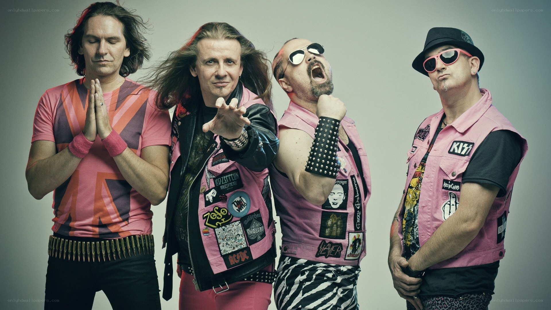 band in pink vests