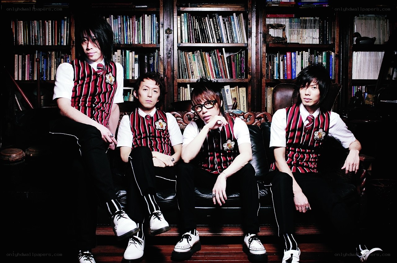 band in striped vests