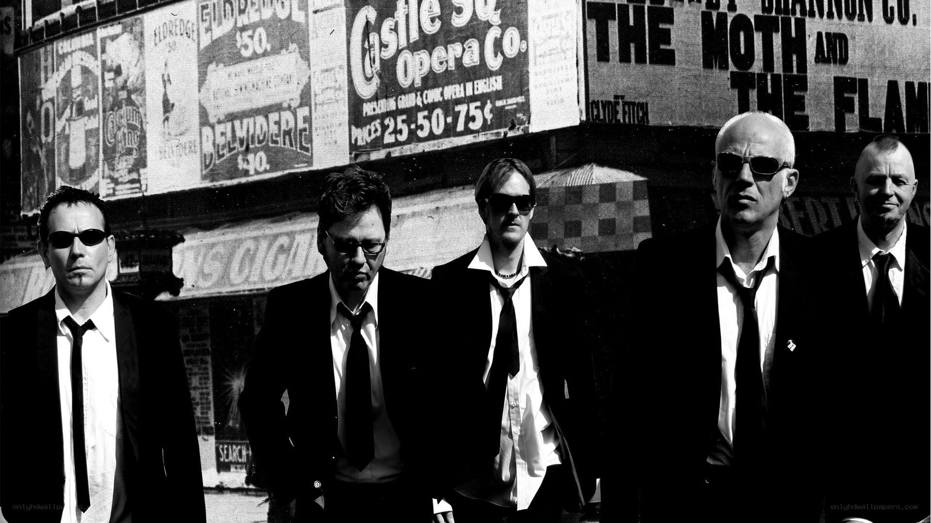 band in suits on street