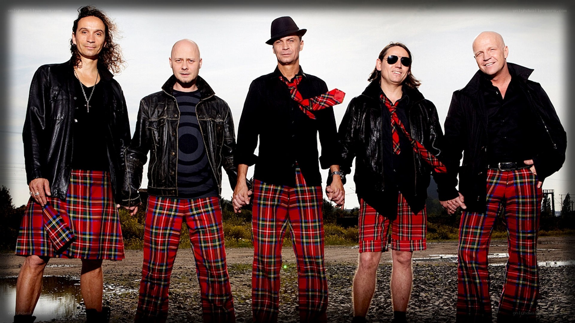 band in tartan kilts