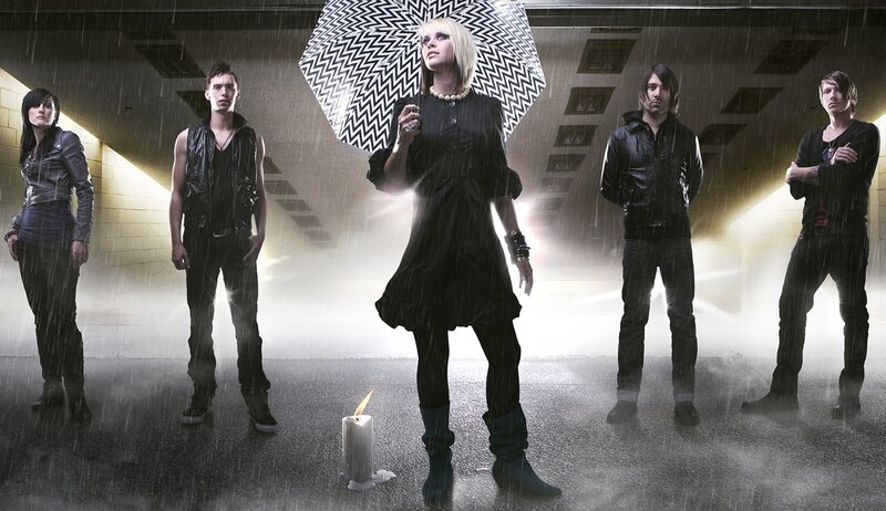 band in the rain with umbrella