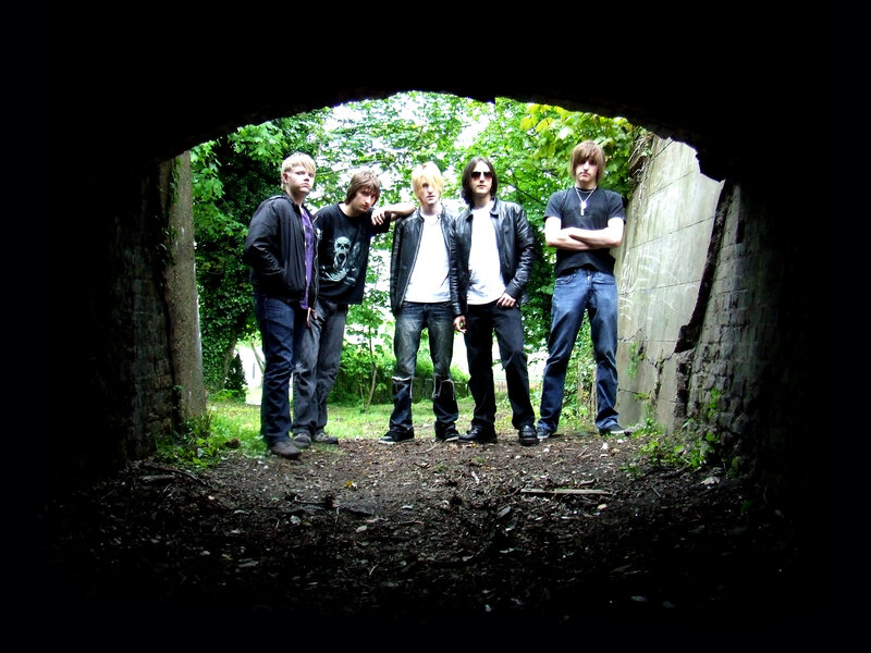 band in tunnel entrance