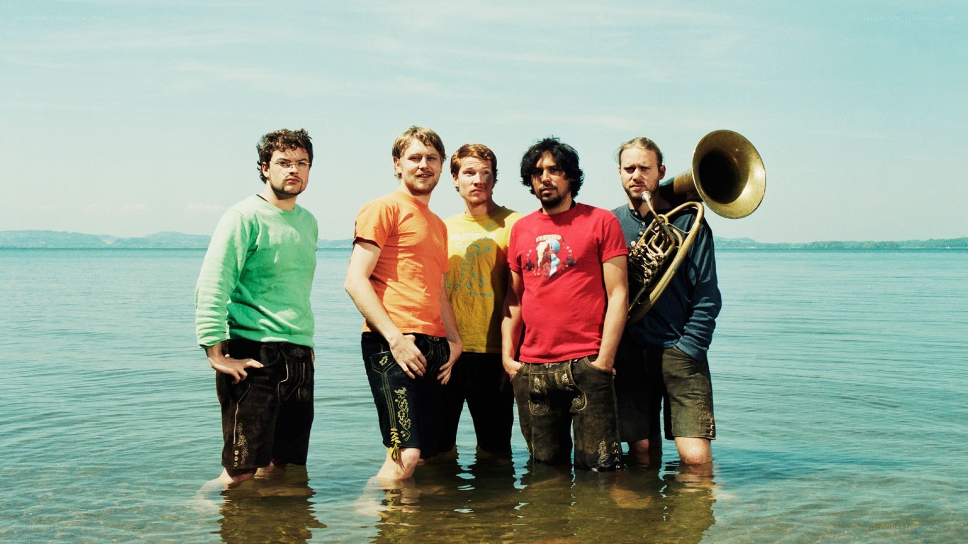 band in water with tuba