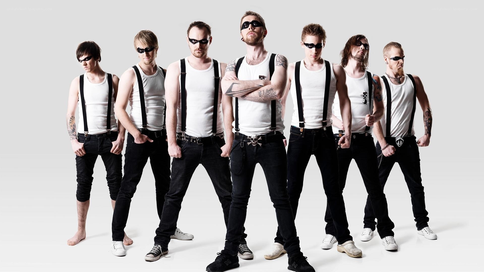 band in white tank tops