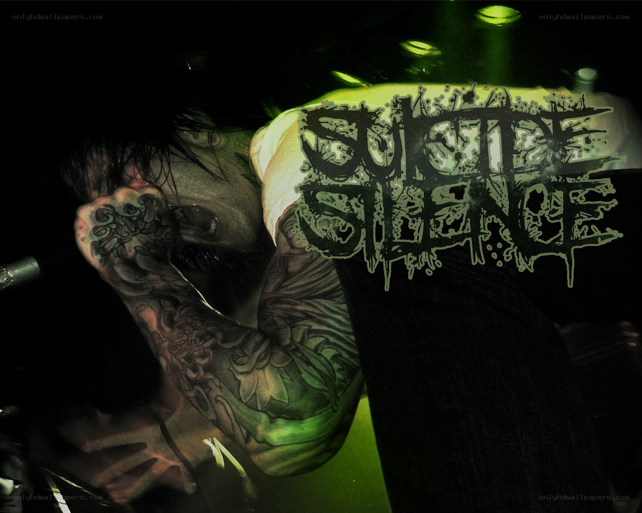 band logo on tattooed arm
