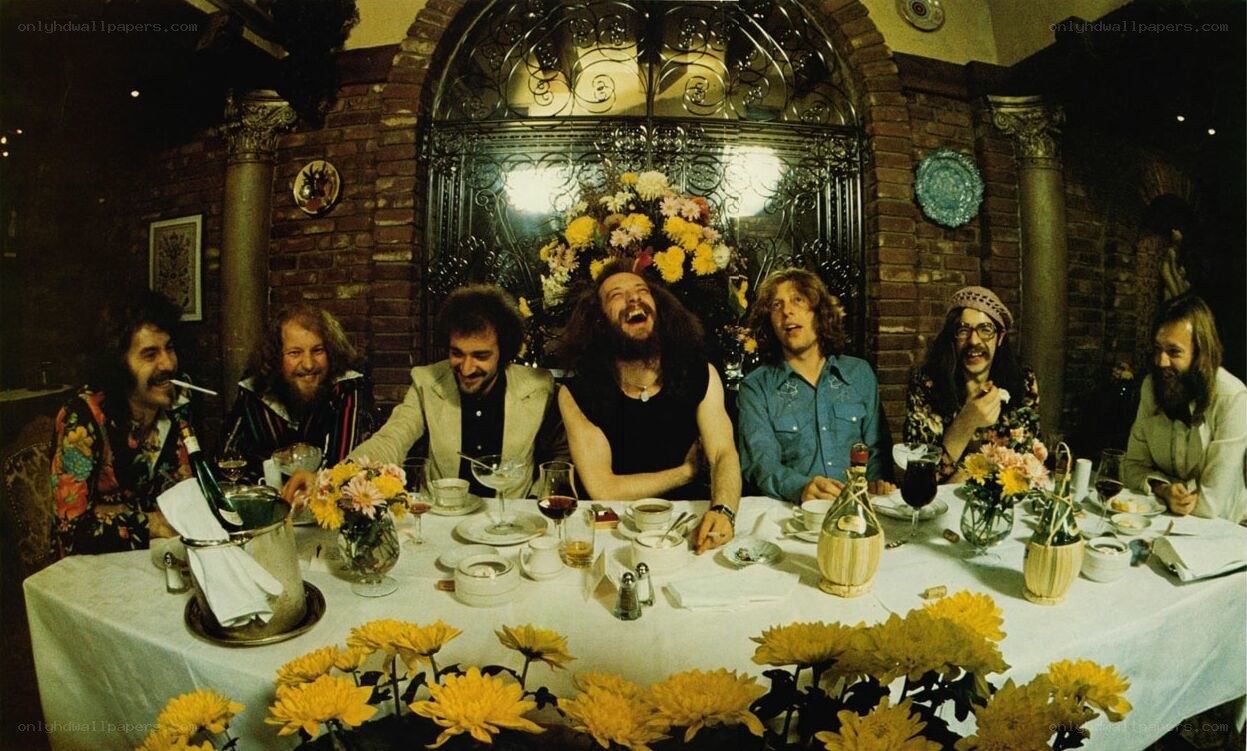Band members at a dinner table
