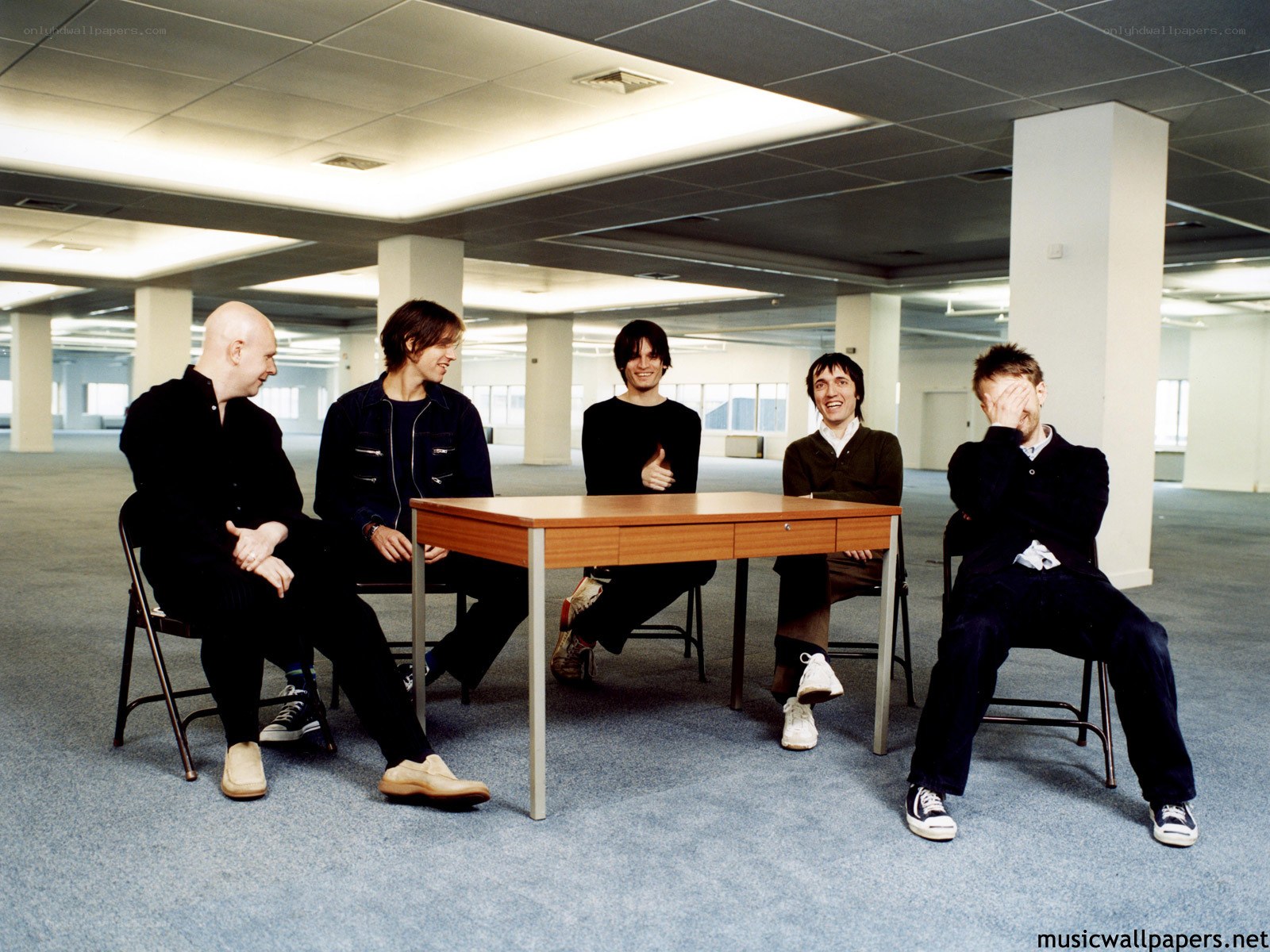 band members at a table