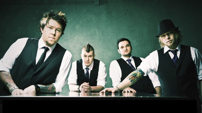 band members at a table