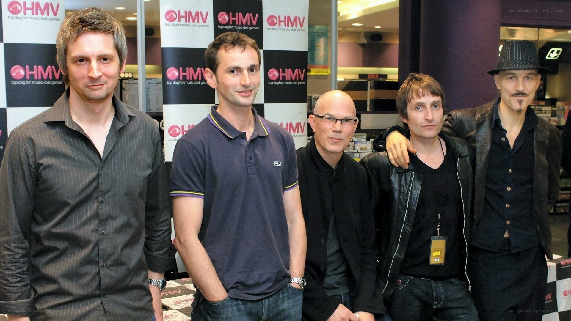 band members at HMV event