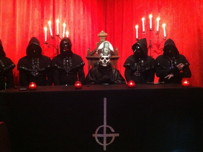 Band Members at Table — Red, Dramatic