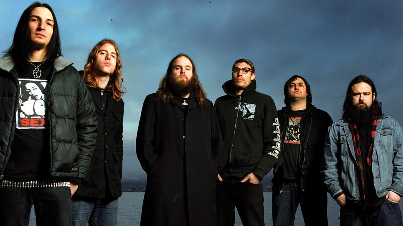 band members by the water