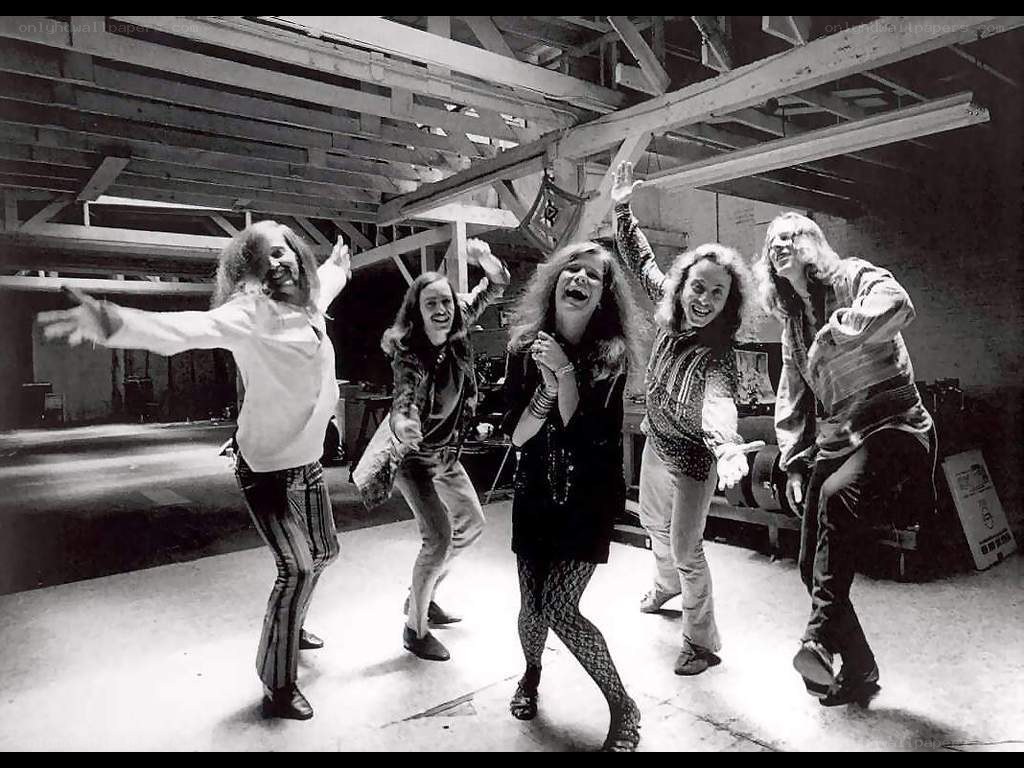 band members dancing in warehouse