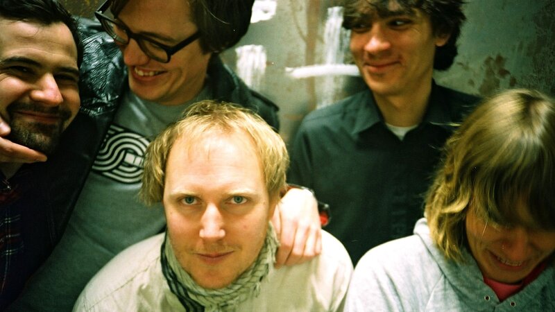 band members in a close group