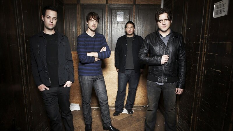 band members in a hallway