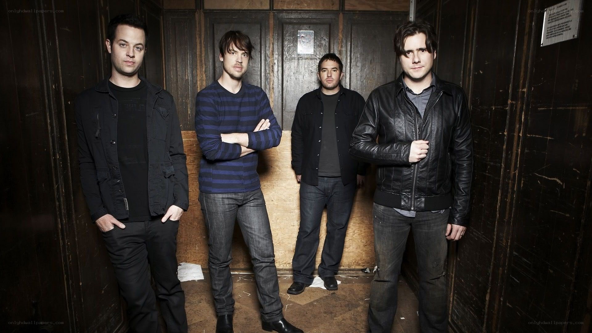 band members in a hallway