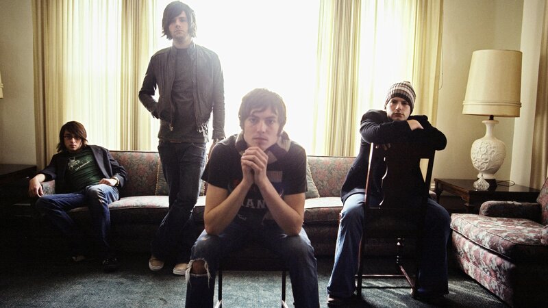 band members in a living room