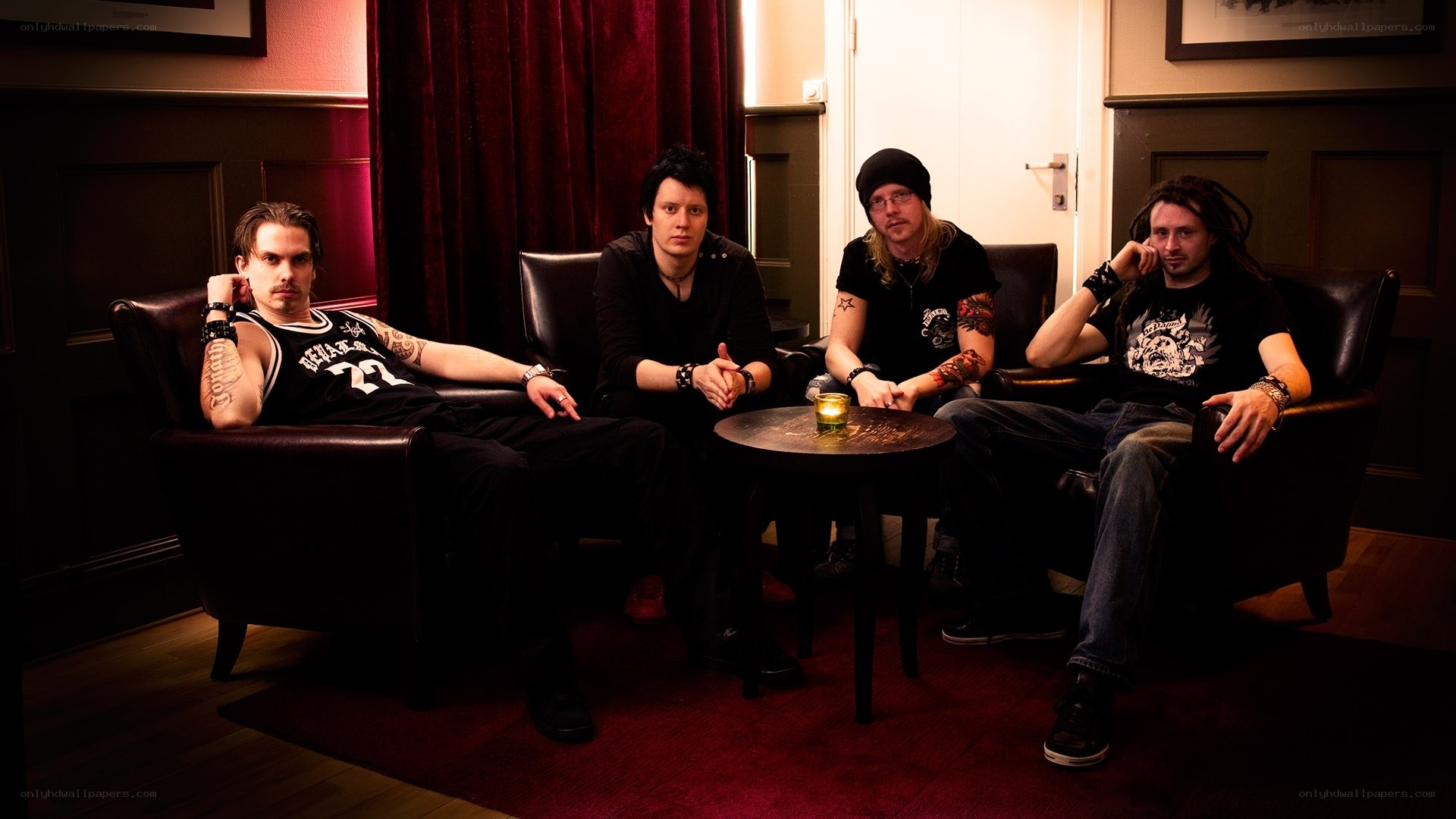 band members in a lounge
