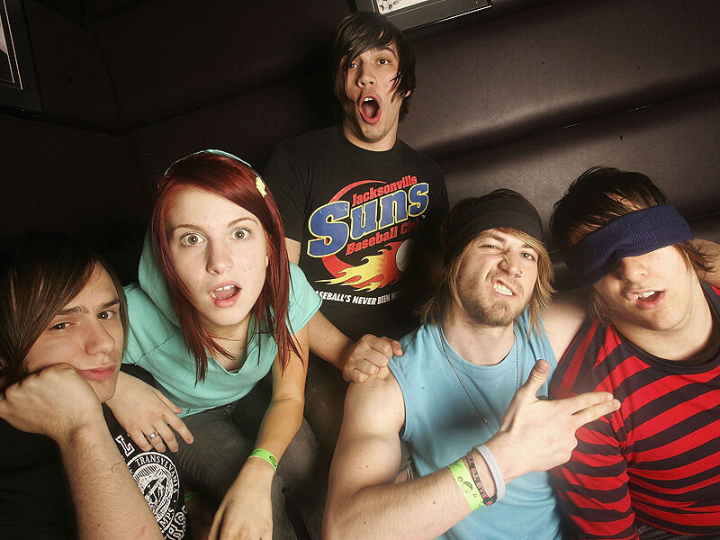 band members in a photo booth