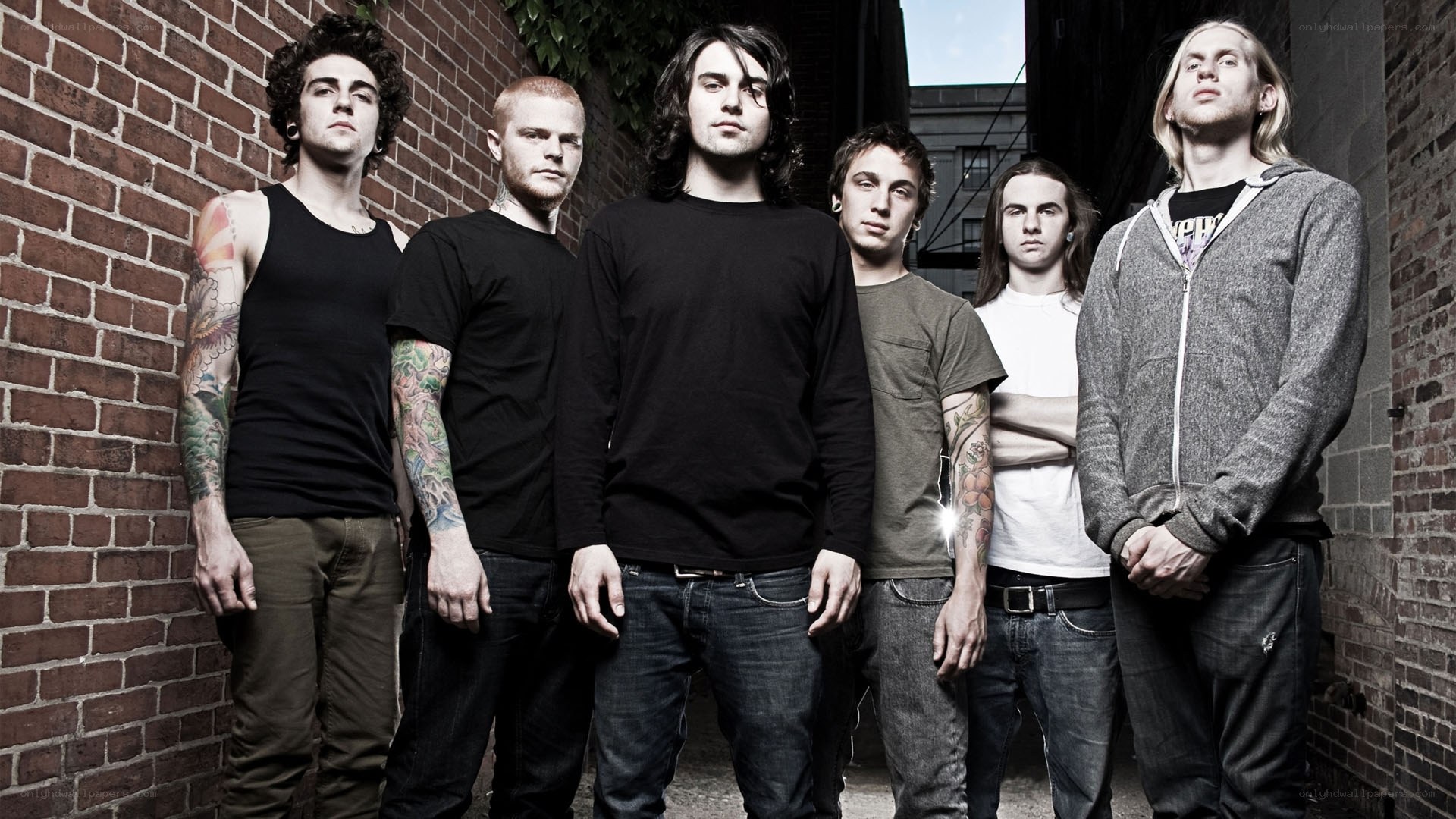 band members in alleyway