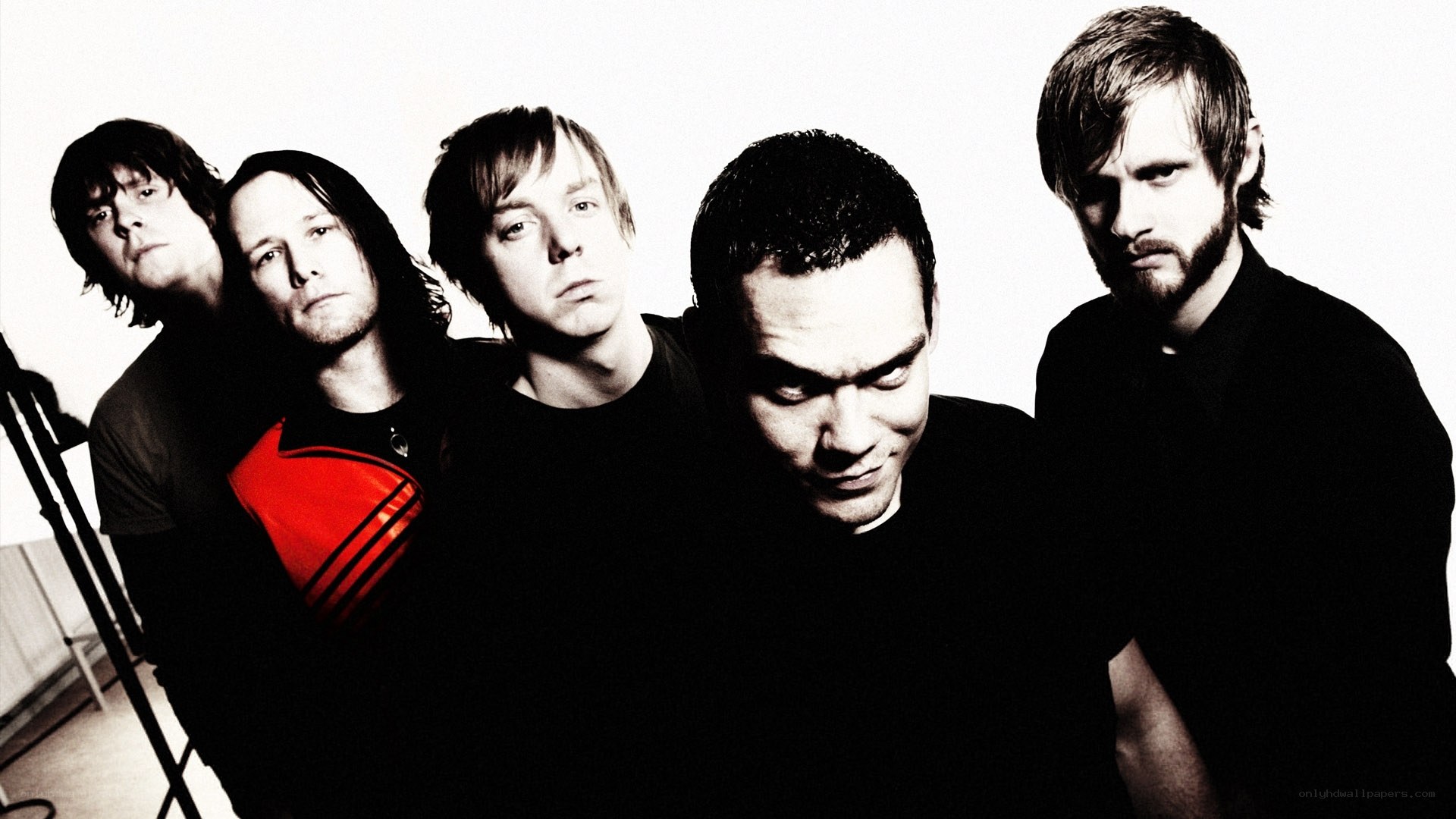 band members in black and red