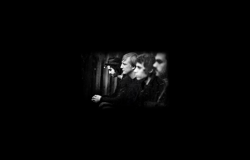 band members in black and white