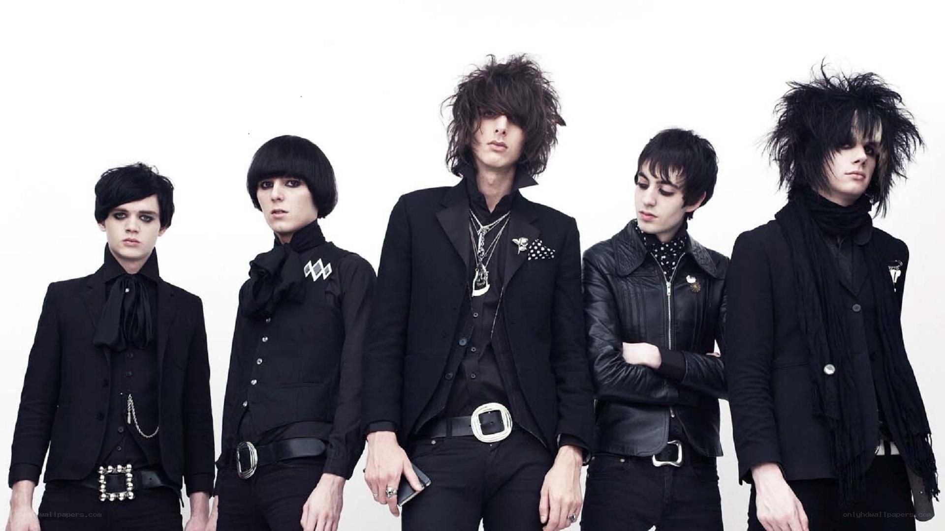 band members in black attire