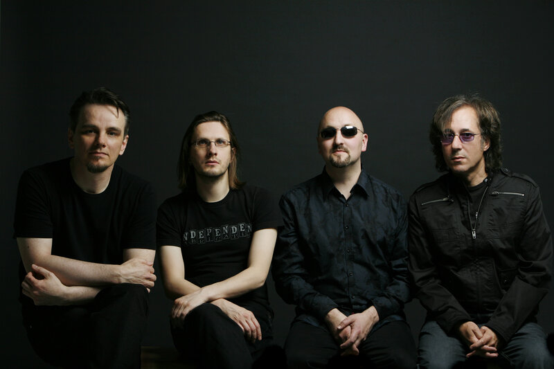 band members in black clothing