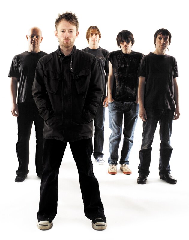 band members in black clothing