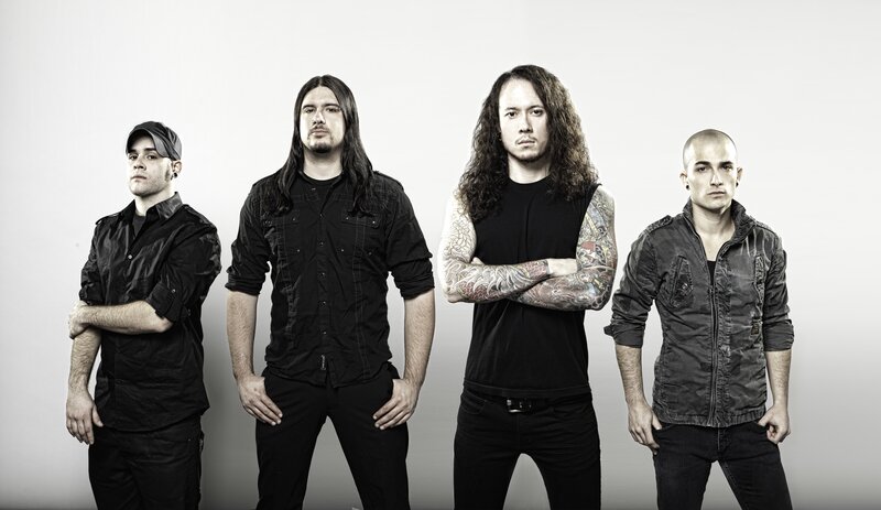 band members in black clothing