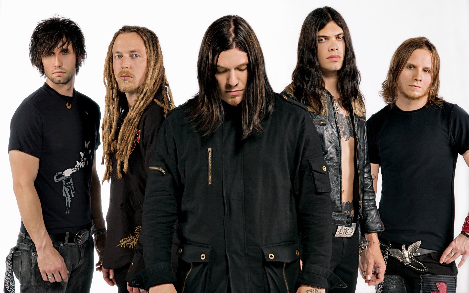 band members in black clothing