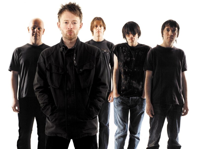 band members in black clothing