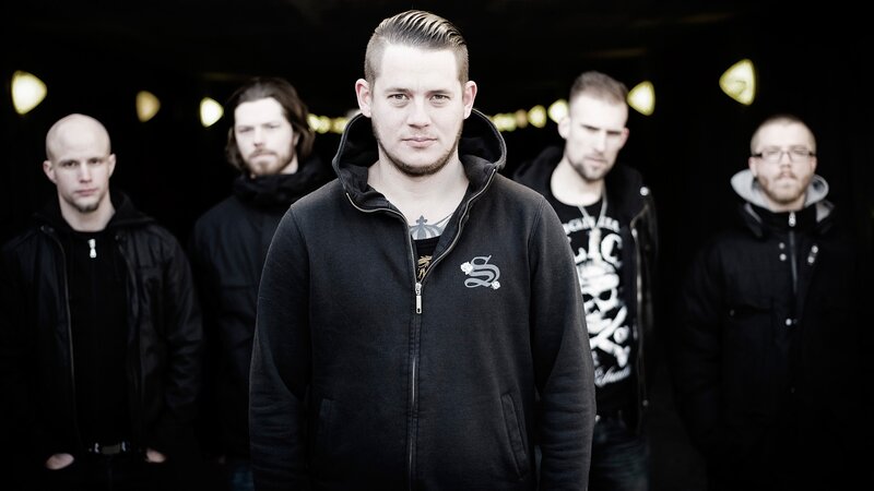 band members in black hoodies