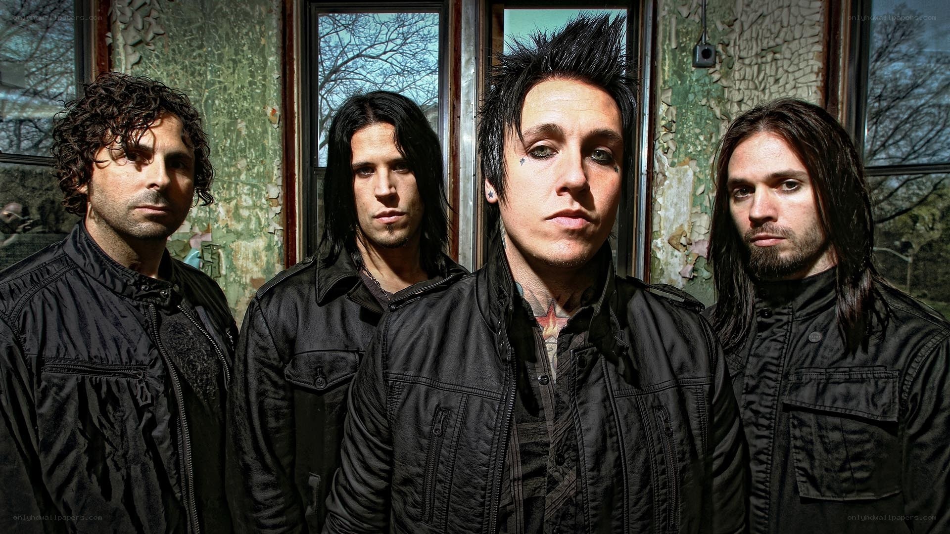 band members in black jackets