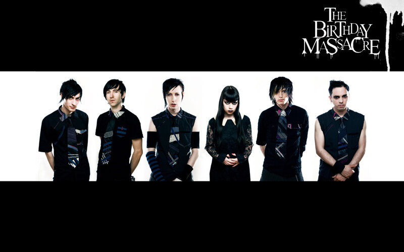 Band Members in Black — Serious