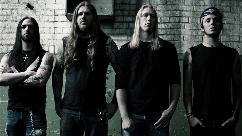 band members in black shirts