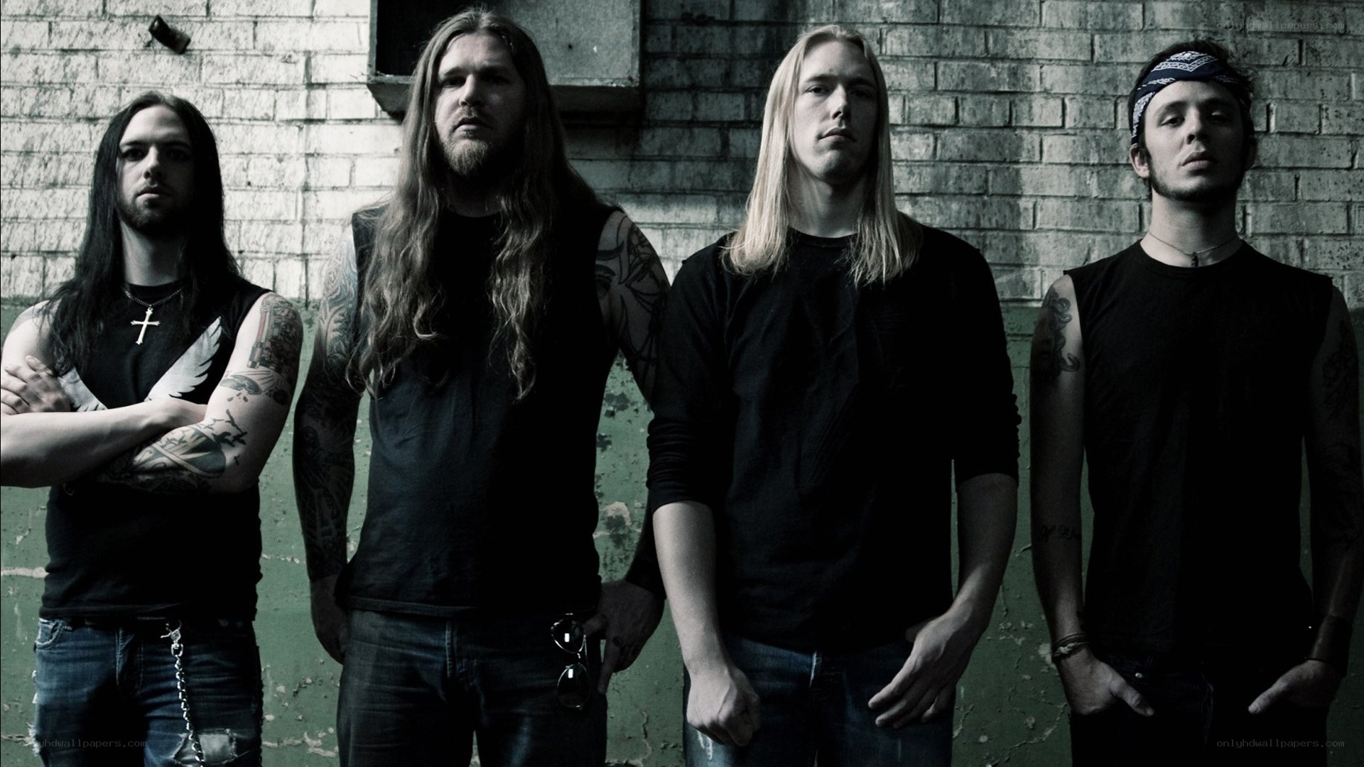 band members in black shirts