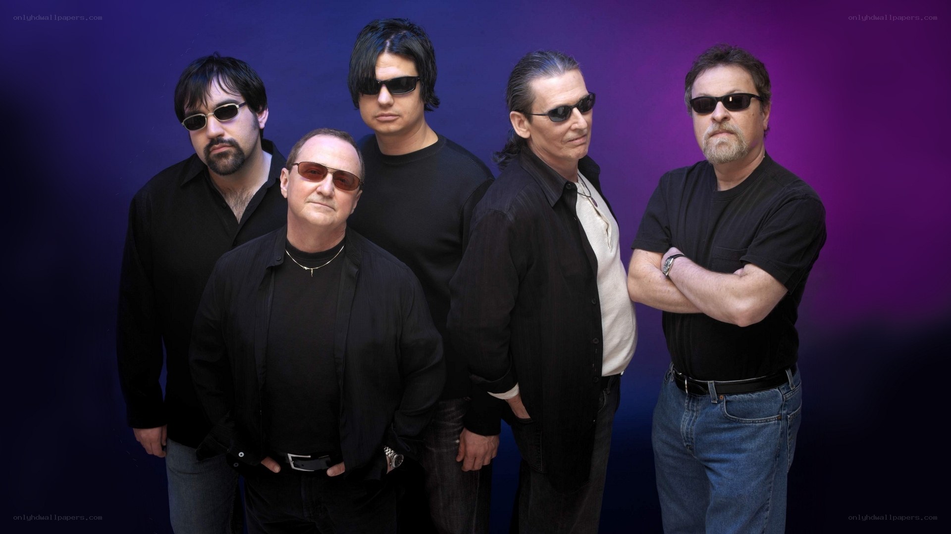 band members in black shirts