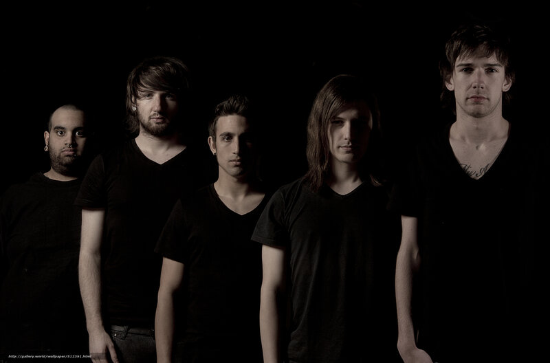 band members in black shirts