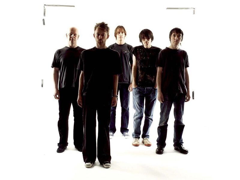 band members in black shirts