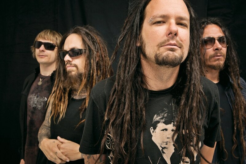 band members in black shirts